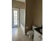 Bathroom showcasing tiled shower and floors, toilet, and vanity with granite countertop at 2981 Winding Trl, Kissimmee, FL 34746