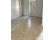 Expansive room with neutral tile flooring and bright light at 2981 Winding Trl, Kissimmee, FL 34746