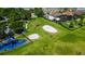 Community park offering a playground, volleyball court, and grassy areas for outdoor activities at 2981 Winding Trl, Kissimmee, FL 34746