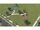 Aerial view of community playground and pickleball court surrounded by lush green space and walking paths at 2985 Gavin Sky Dr, Kissimmee, FL 34744