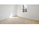 Cozy bedroom with plush carpet and a window providing natural light at 2985 Gavin Sky Dr, Kissimmee, FL 34744