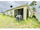 Backyard featuring screened porch and room for outdoor activities at 3082 Royal Tern Dr, Winter Haven, FL 33881