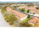 An aerial view of the community showcasing multiple townhomes with well-maintained landscaping at 3102 Ashland N Ln # 3152, Kissimmee, FL 34741