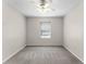 Neutral bedroom featuring a ceiling fan and a window with a blinds at 3102 Ashland N Ln # 3152, Kissimmee, FL 34741