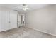 Bedroom featuring a ceiling fan and closet space at 3102 Ashland N Ln # 3152, Kissimmee, FL 34741