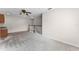 Upstairs loft area featuring carpet floors and staircase with white and wood railings at 3102 Ashland N Ln # 3152, Kissimmee, FL 34741