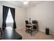 Bedroom with a simple desk and chair arrangement, suitable for a home office at 3142 Hill Point St, Minneola, FL 34715