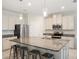 Contemporary kitchen with granite countertops, stainless steel appliances, and an open layout perfect for entertaining at 3142 Hill Point St, Minneola, FL 34715