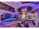 Gaming area featuring a Star Wars themed basement with murals and custom lighting, plus a pool table and game space at 3624 Lily Ln, Davenport, FL 33897