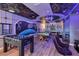 Star Wars themed basement with pool table, foosball table, space murals and galaxy painted ceilings at 3624 Lily Ln, Davenport, FL 33897