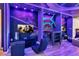 A custom-painted Star Wars themed basement includes several gaming and entertainment areas at 3624 Lily Ln, Davenport, FL 33897