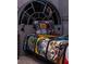 Close up shot of the headboard and bed in the Star Wars themed bedroom at 3624 Lily Ln, Davenport, FL 33897
