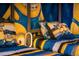 Minion themed bedroom with twin beds and decorative pillows at 3624 Lily Ln, Davenport, FL 33897