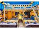 Bedroom featuring Minion-themed bunkbeds and twin beds with matching decor at 3624 Lily Ln, Davenport, FL 33897