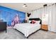 Bedroom features a mural wall and Mickey Mouse decorations, creating a whimsical and themed space at 3624 Lily Ln, Davenport, FL 33897