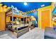Bedroom featuring a Minion themed bunkbed, twin bed, and decor at 3624 Lily Ln, Davenport, FL 33897