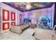 Unique Star Wars themed bedroom featuring custom paint, beds, and themed accents throughout at 3624 Lily Ln, Davenport, FL 33897