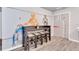 A bar table with seating in the game room featuring Star Wars themed decor at 3624 Lily Ln, Davenport, FL 33897