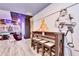 A stylish game room with bar table, seating, and custom themed decor at 3624 Lily Ln, Davenport, FL 33897