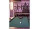 A Star Wars themed game room with an impressive mural and a pool table at 3624 Lily Ln, Davenport, FL 33897