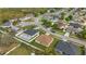 An aerial view showcases a residential neighborhood with well-maintained homes and landscaping at 3840 Wood Thrush Dr, Kissimmee, FL 34744