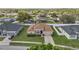 Charming single-story home with a well-manicured lawn and a two-car garage at 3840 Wood Thrush Dr, Kissimmee, FL 34744