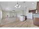 Spacious living and dining area featuring sleek floors and an abundance of natural light at 3840 Wood Thrush Dr, Kissimmee, FL 34744