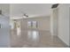 Spacious living room with tile flooring and natural light streaming through the windows at 3840 Wood Thrush Dr, Kissimmee, FL 34744