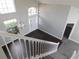 Foyer with dark flooring and staircase at 409 Lytton Cir, Orlando, FL 32824