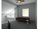 Upstairs loft area includes a bed and views to the outside at 409 Lytton Cir, Orlando, FL 32824