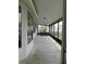 Enclosed patio features concrete floors and natural lighting, ideal for outdoor living at 409 Lytton Cir, Orlando, FL 32824
