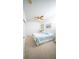 Comfortable bedroom featuring one bed, neutral walls, and a ceiling fan at 466 Peppermill Cir, Kissimmee, FL 34758
