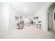 Well-lit dining area features an elegant table setting with neutral colors and plenty of natural light at 466 Peppermill Cir, Kissimmee, FL 34758