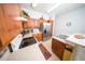 Kitchen featuring stainless steel appliances, wood cabinets, and a tile backsplash at 466 Peppermill Cir, Kissimmee, FL 34758