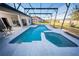 Beautiful backyard pool with screened enclosure, jacuzzi, and patio, perfect for Florida living at 466 Peppermill Cir, Kissimmee, FL 34758