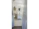 Charming bathroom features a vanity with storage, a mirror, and stylish decor at 4861 Haines Circle, Orlando, FL 32822