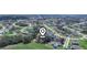 Aerial view of neighborhood with locator pin in the center of image at 509 Lakeview Dr, Poinciana, FL 34759