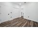 Clean bedroom with attached bathroom and large double-door closet at 509 Lakeview Dr, Poinciana, FL 34759