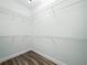 Spacious walk-in closet with ample shelving for storage at 509 Lakeview Dr, Poinciana, FL 34759