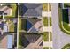 Overhead view of neighborhood homes featuring solar panels on roofs at 579 Lucerne Blvd, Winter Haven, FL 33881
