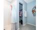 Shower and closet in bathroom with walk in closet at 579 Lucerne Blvd, Winter Haven, FL 33881