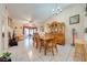 Spacious dining room showcases a decorative hutch, chandelier, and an ornate wood table with chairs at 86 Pine Island Cir, Kissimmee, FL 34743