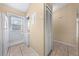 Laundry room area features a washer/dryer and access to the outside at 86 Pine Island Cir, Kissimmee, FL 34743