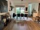 Elegant dining area with modern lighting and access to the outdoor space at 9690 Emerald Berry Dr, Winter Garden, FL 34787