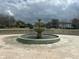 Exterior view of community fountain in the neighborhood at 9690 Emerald Berry Dr, Winter Garden, FL 34787