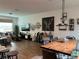 Open concept living and dining area with stylish decor and ample natural light at 9690 Emerald Berry Dr, Winter Garden, FL 34787