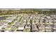 Aerial view of a residential neighborhood showcasing well-maintained homes and landscaping at 9811 Aurea Moss Ln, Orlando, FL 32832