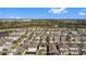 Aerial view of a residential neighborhood showcasing well-maintained homes, landscaping, and community amenities at 9811 Aurea Moss Ln, Orlando, FL 32832