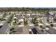 Neighborhood aerial view showcasing modern homes, manicured lawns, and tree-lined streets at 9811 Aurea Moss Ln, Orlando, FL 32832