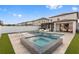 Backyard features a swimming pool, jacuzzi, patio and lounging area with nice fencing at 9811 Aurea Moss Ln, Orlando, FL 32832